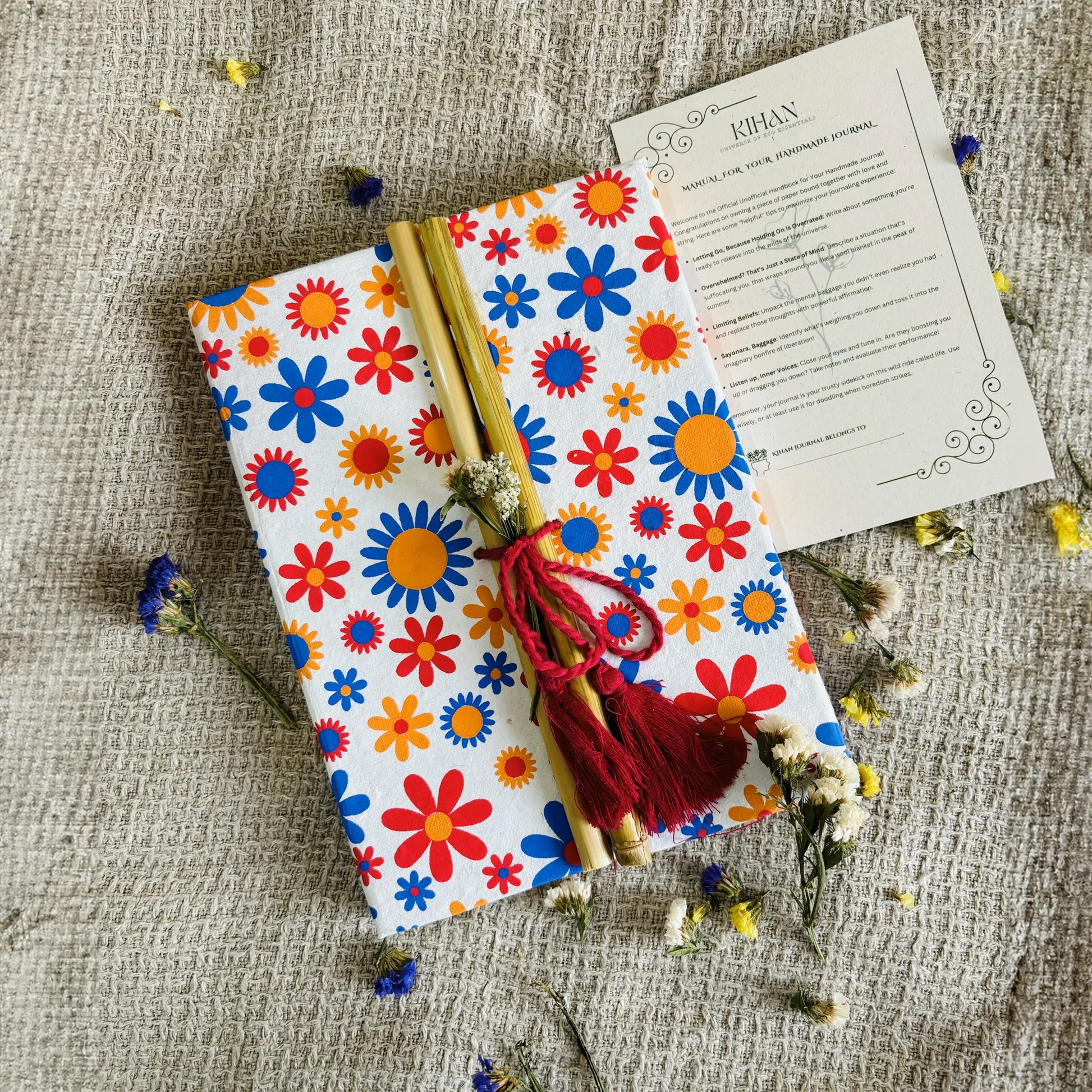 Handmade paper bamboo journal in rainbow bloom - front view