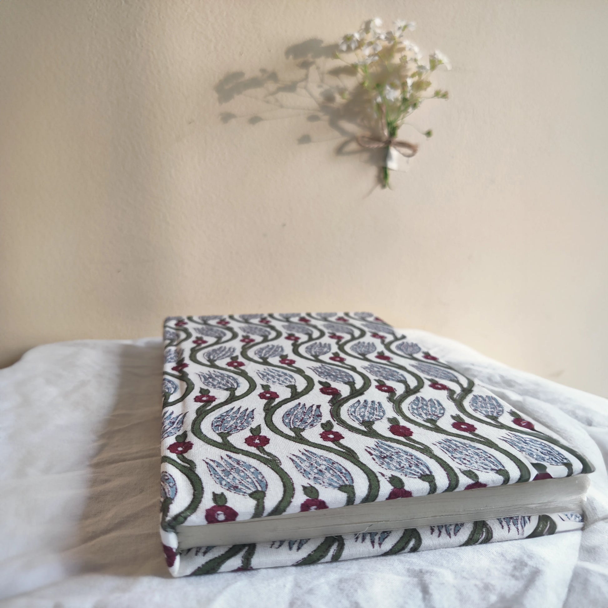 Handmade paper hardbound journal in miraya - flatlay view