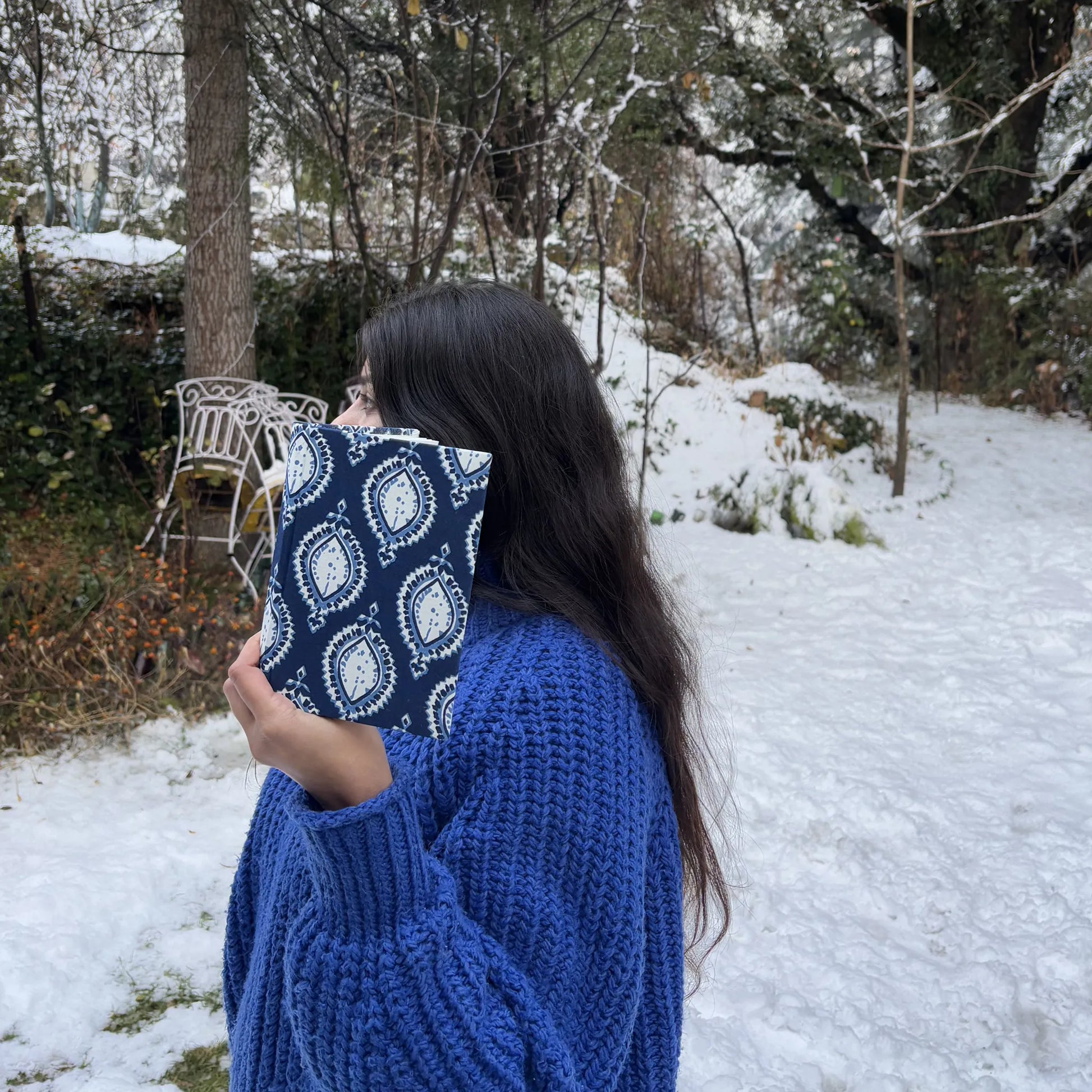 Handmade paper hardbound journal in mystic indigo - holding view