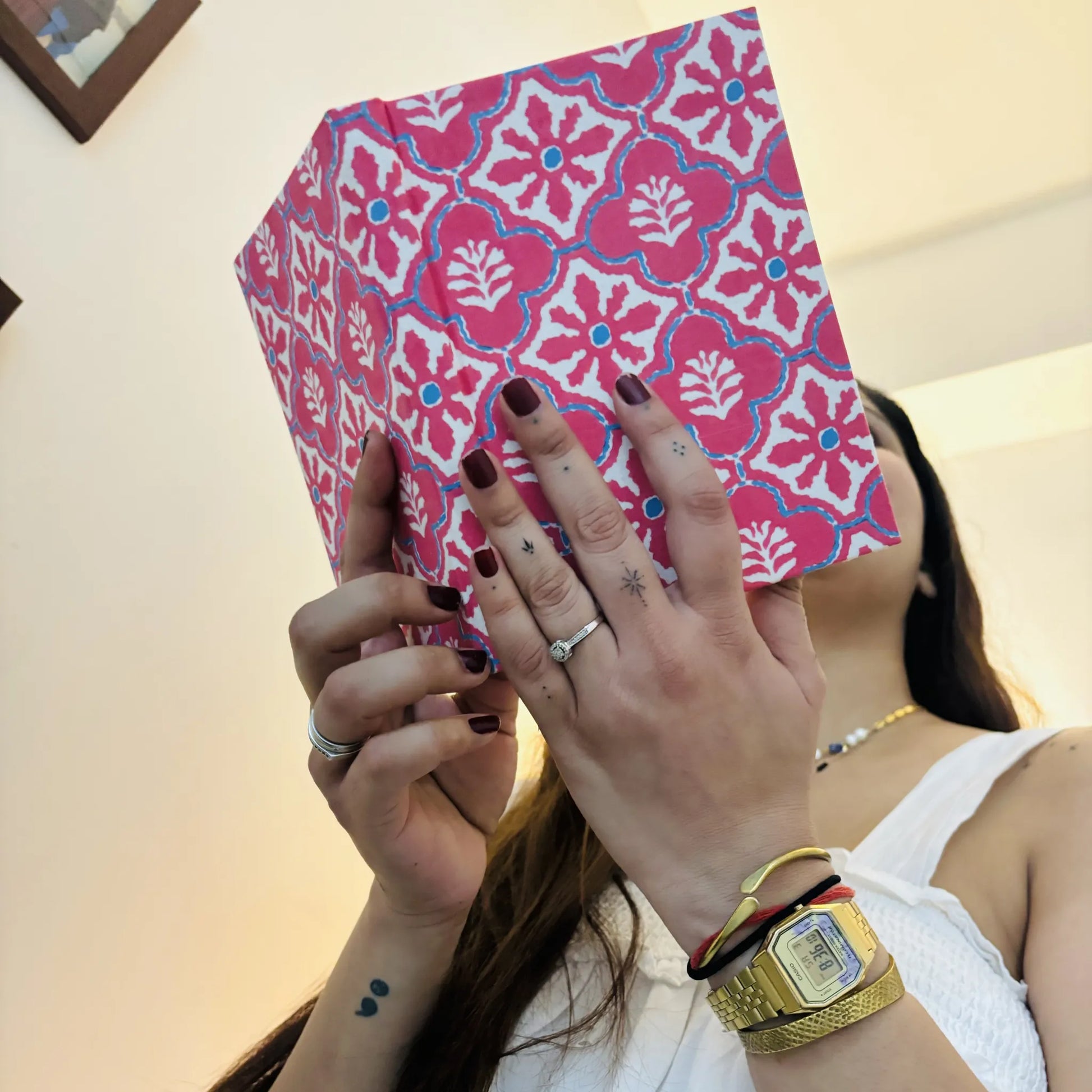 Handmade paper hardbound journal in rossy reverie - holding view