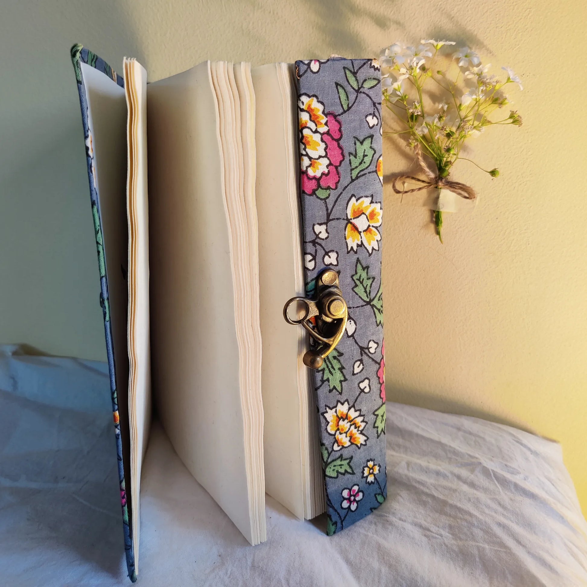 Handmade paper lock journal in aurorae - open view