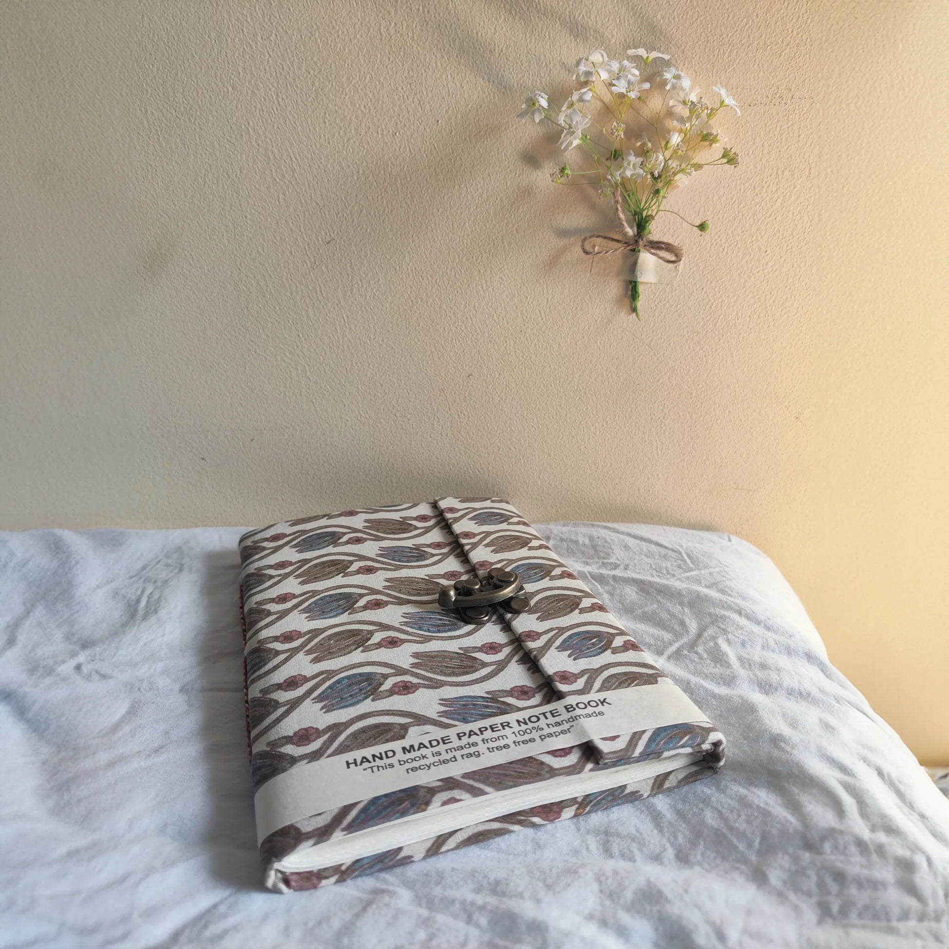 Handmade paper lock journal in indigem - flatlay view