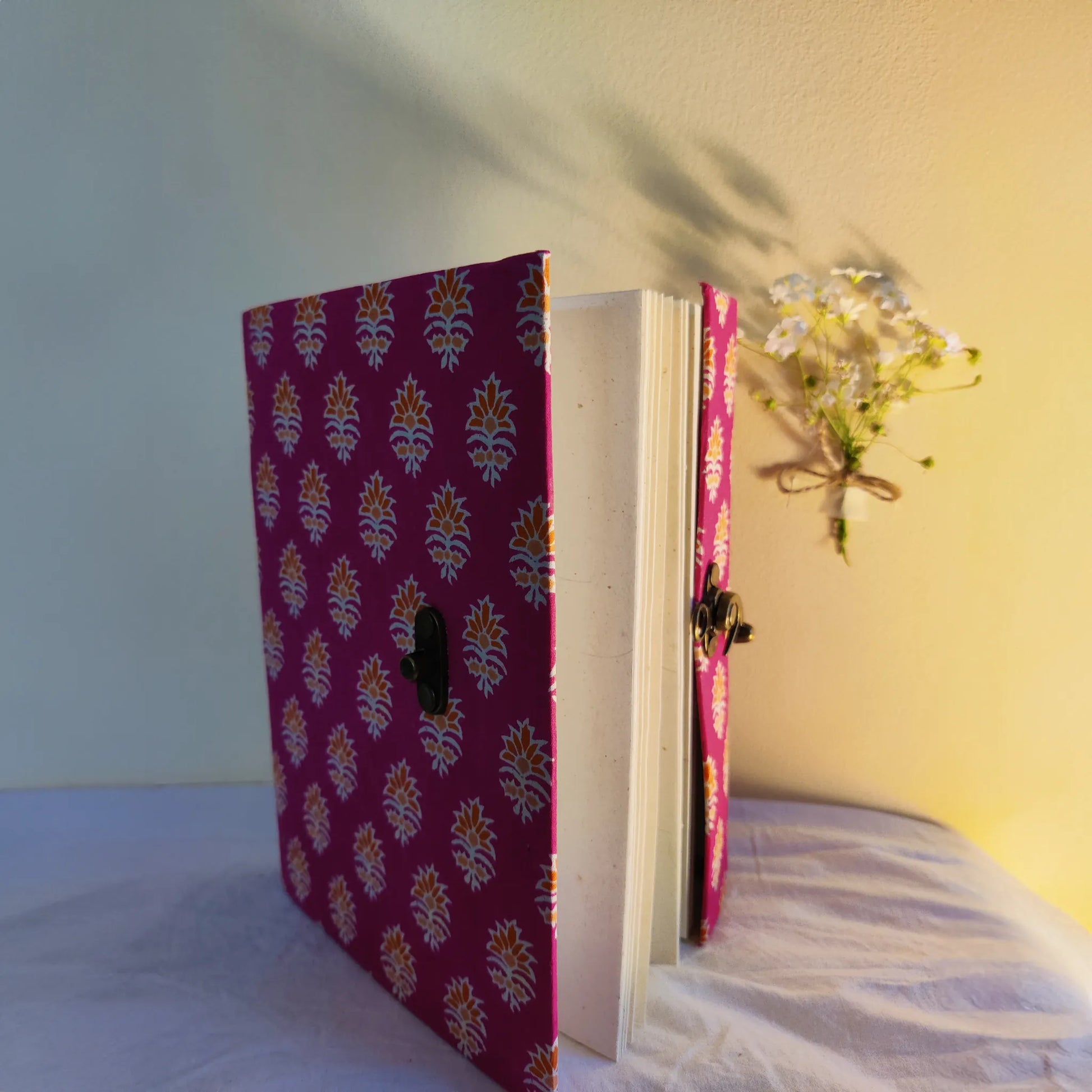 Handmade paper lock journal in magentea - open view