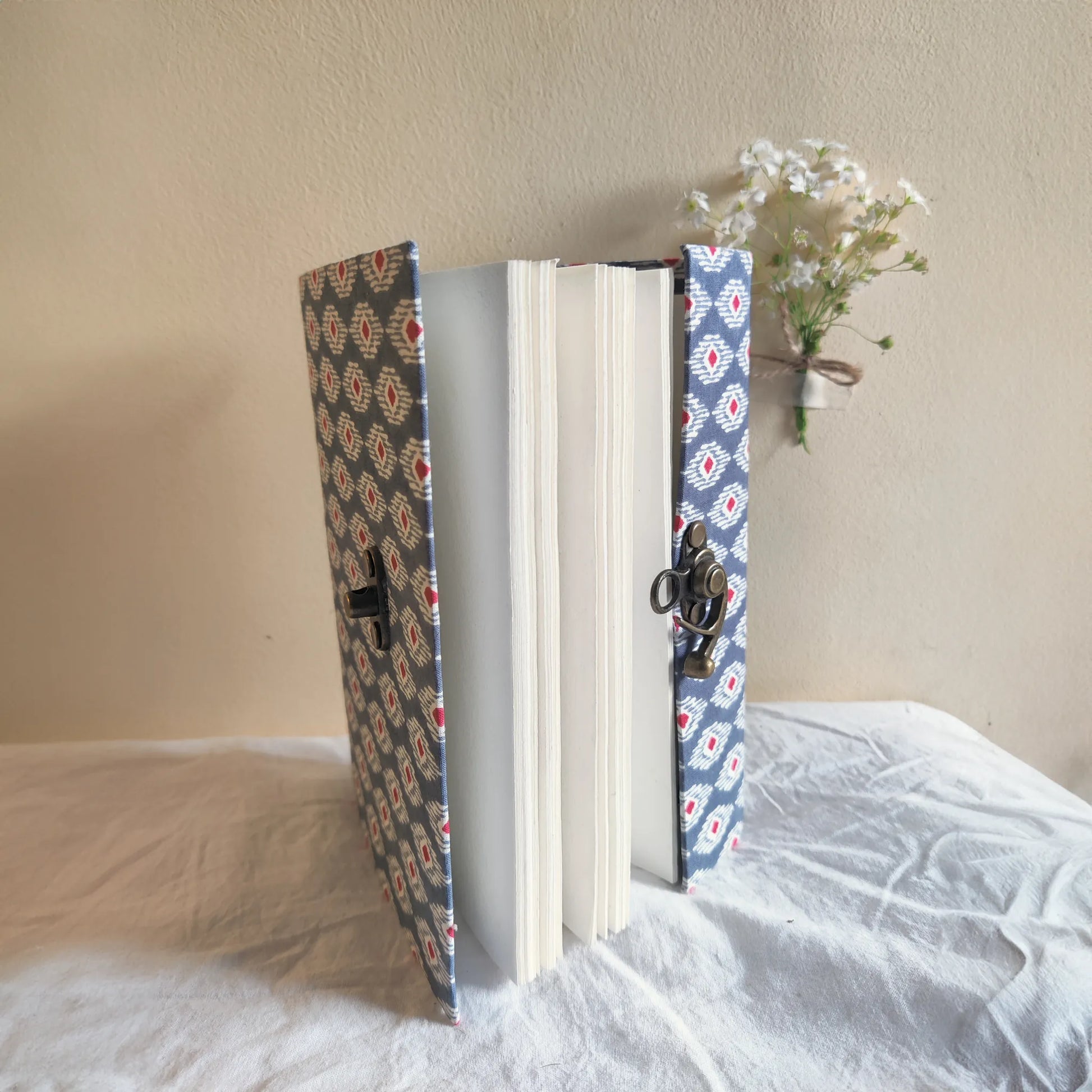 Handmade paper lock journal in navynest - open view