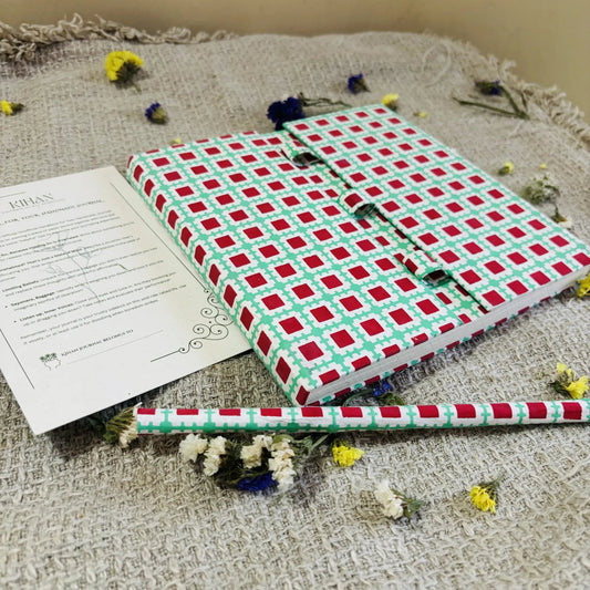 Handmade paper pen journal in geometric harmony - flatlay view