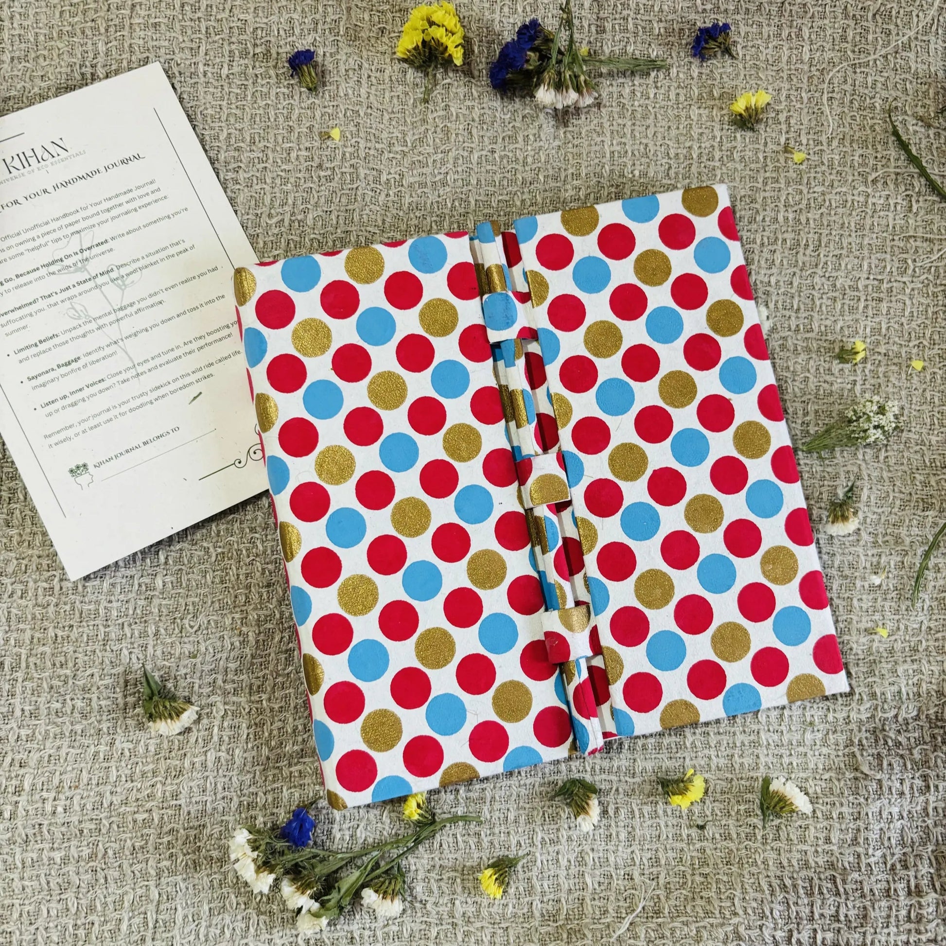 Handmade paper pen journal in pinkadoodle - flatlay view