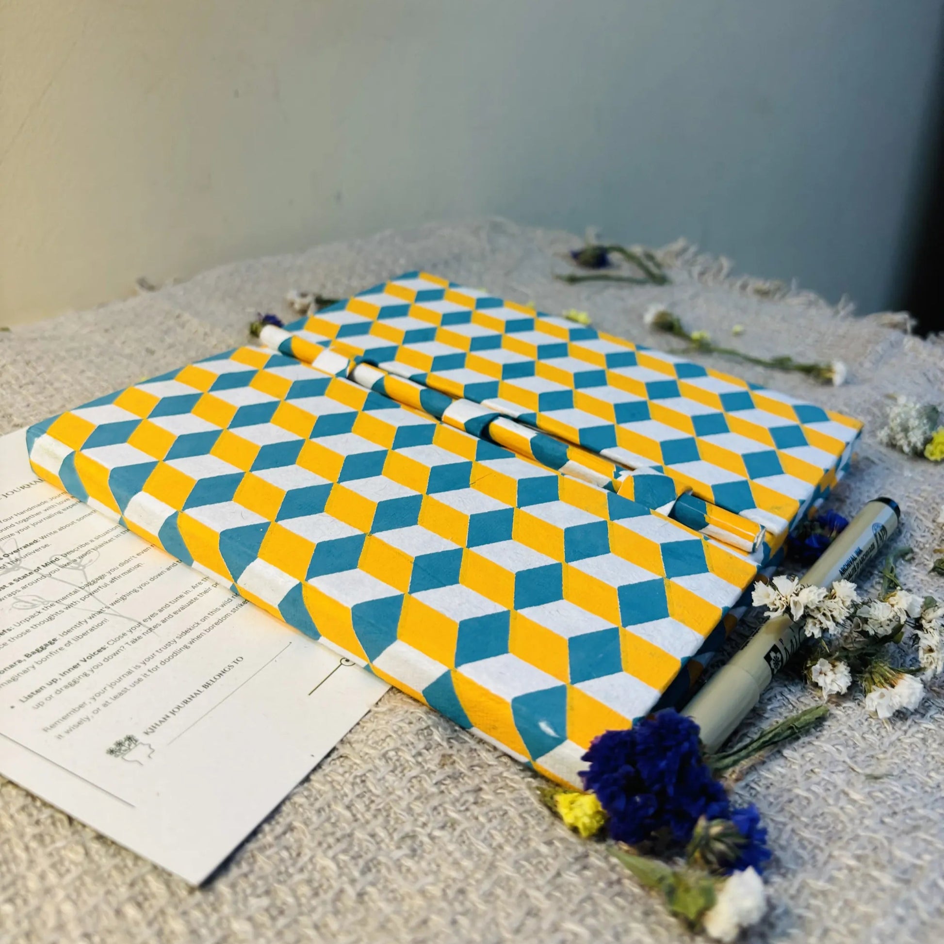 Handmade paper pen journal in seize the moment - flatlay view