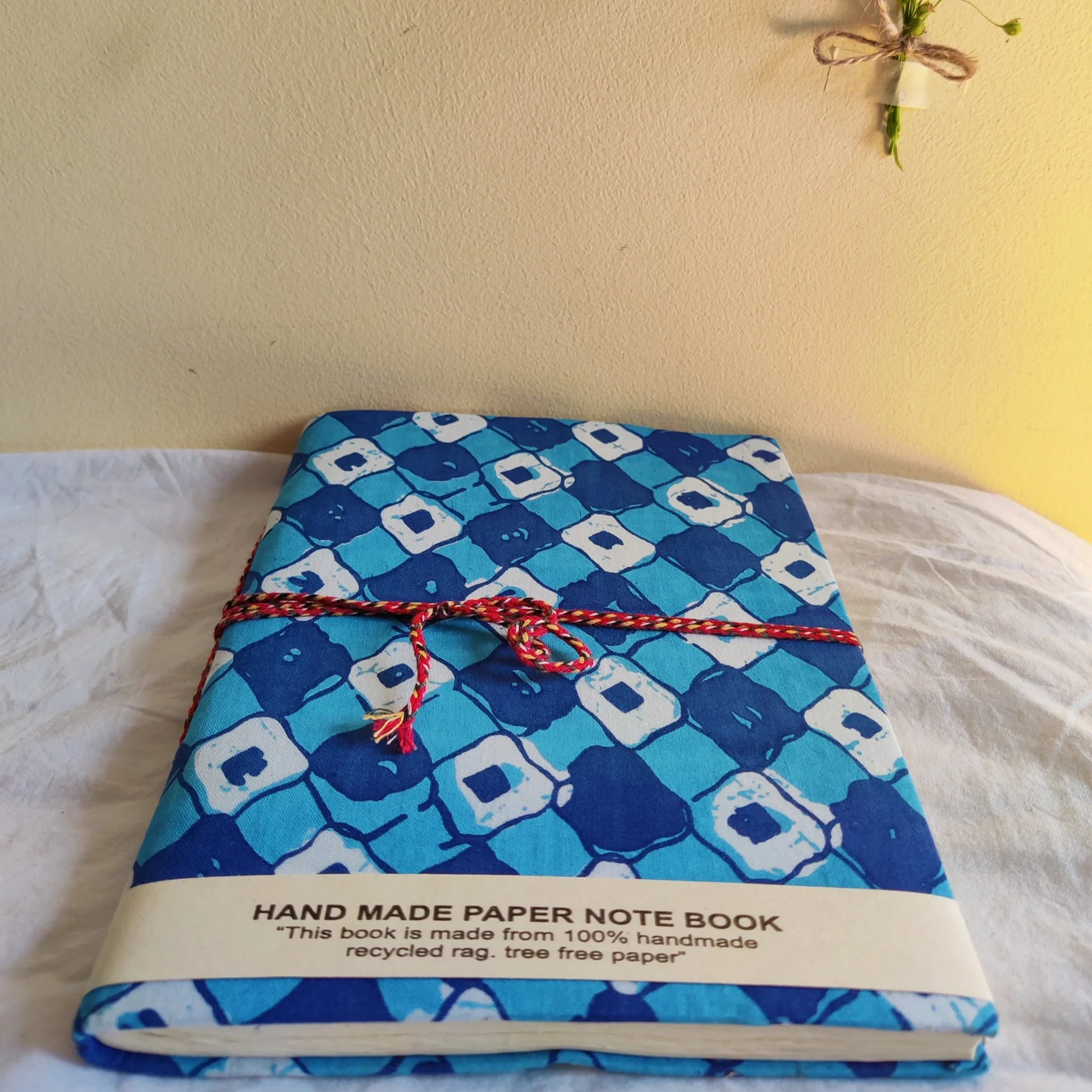 Handmade paper rope journal in azure muse - flatlay view