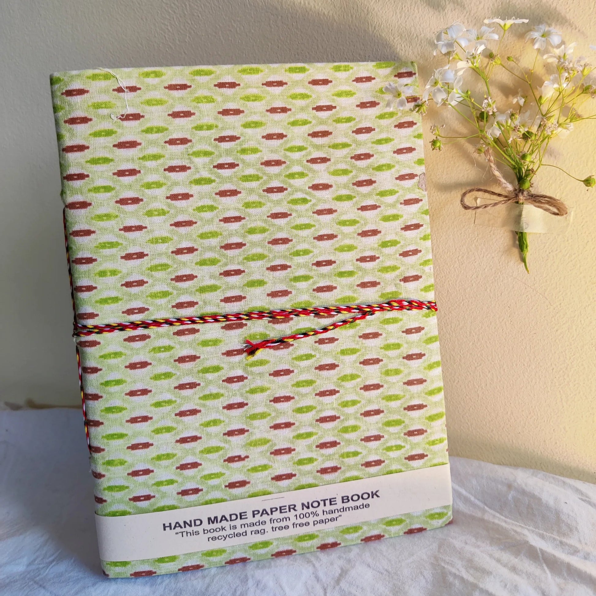 Handmade paper rope journal in emerald archive - front view