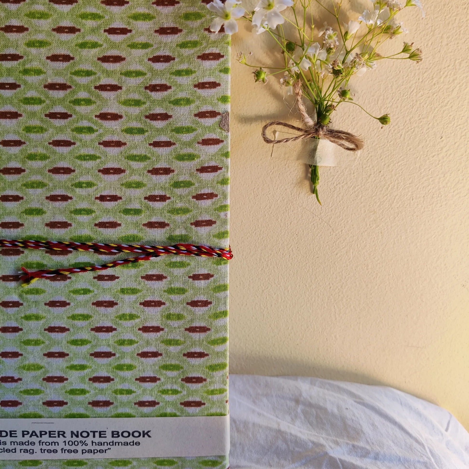 Handmade paper rope journal in emerald archive - pattern view