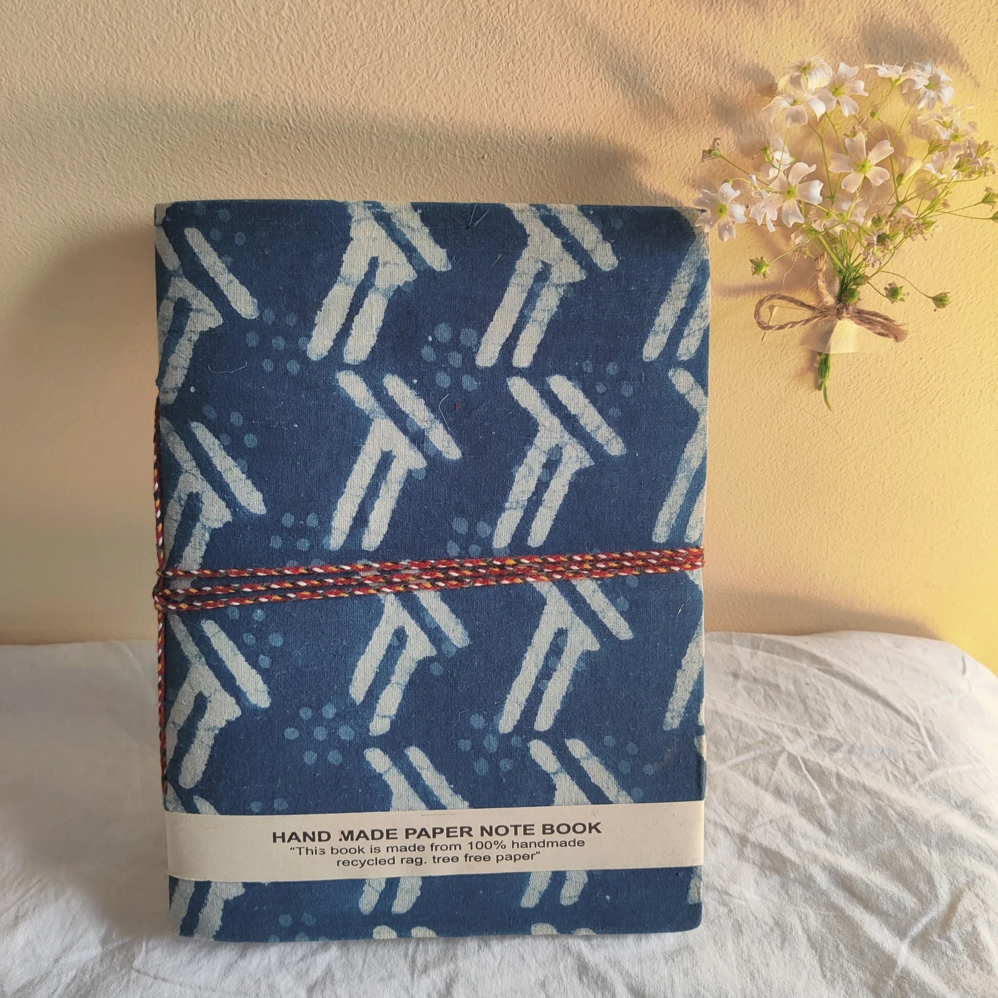 Handmade paper rope journal in indigo arrow - front view