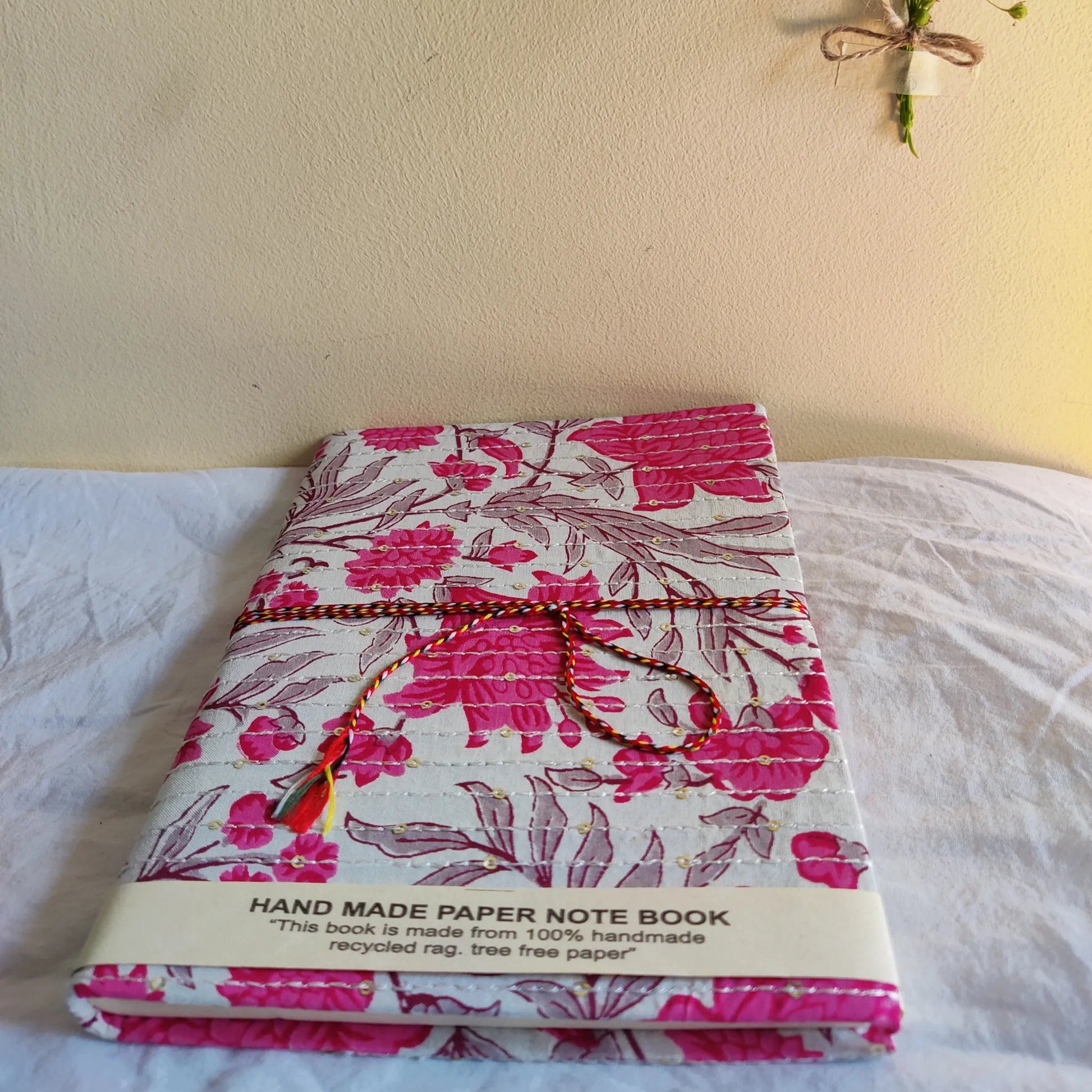 Handmade paper rope journal in whispering meadow - flatlay view