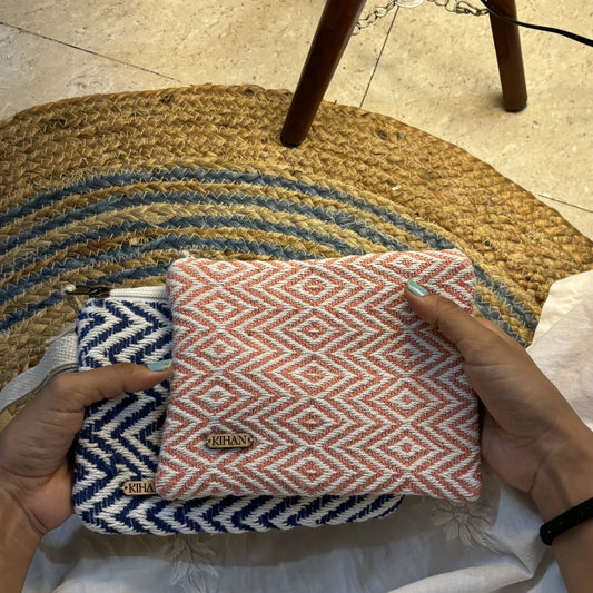 Handloom pouch multipurpose in coral twist - holding view